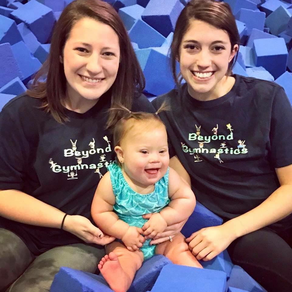 39929246_2090200407963942_4191036522025189376_n Child and gym employees in foam pit at mommy meetup
